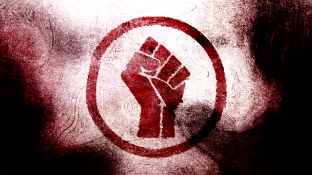 Red raised fist symbol on a high contrasted grungy and dirty, animated, distressed and smudged 4k video background with swirls and frame by frame motion feel with street style for the concepts of solidarity,support,human rights,worker rights,strength