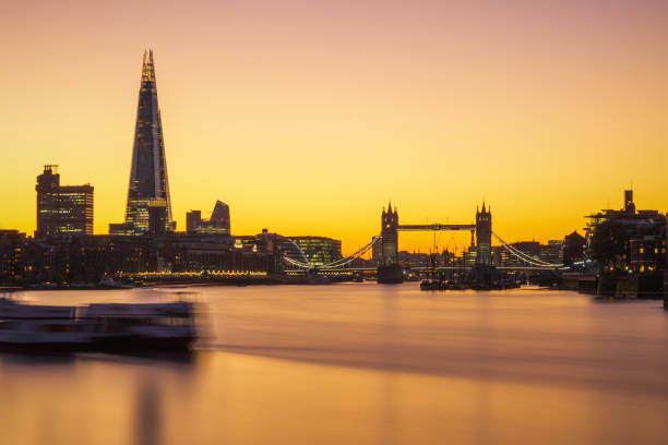 istock Illuminated London city skyline with Tower bridge 1155840327