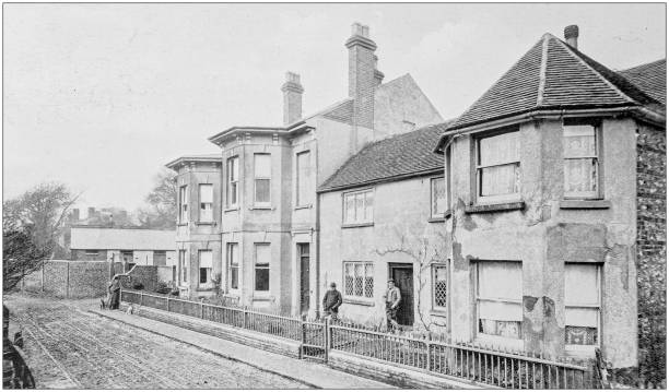 istock Antique vintage black and white photo: British countryside house 1155846111