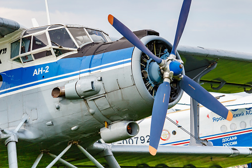 Balashikha, Moscow region, Russia - May 25, 2019: Pilots cabin and engine with four blade propeller of soviet aircraft biplane Antonov AN-2 closeup at Aviation festival Sky Theory and Practice 2019