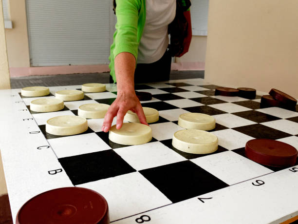 istock Playing checkers on the street 1155857635