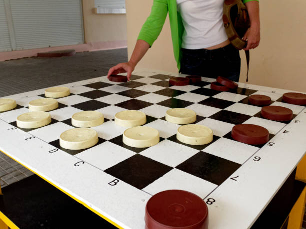 istock Playing checkers on the street 1155857839