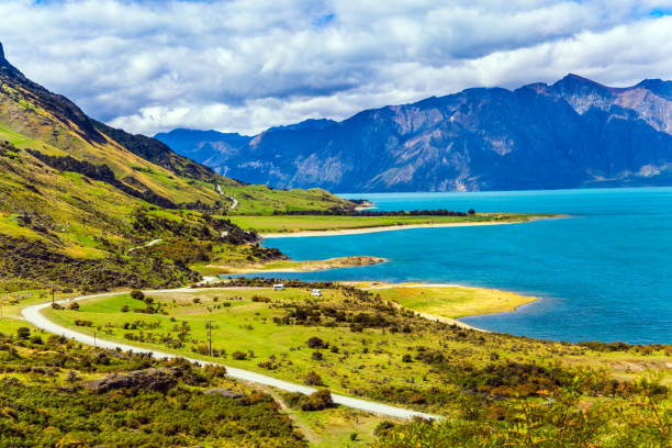 istock Green grassy mountains surround the Javea Lake 1155857851