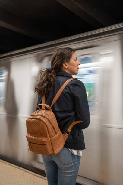 istock Woman waiting for subway 1155862329