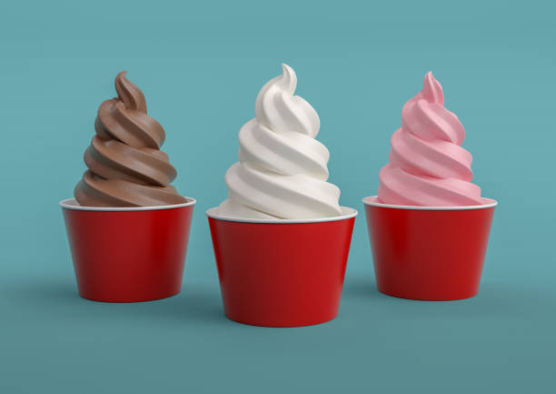 Soft Serve Ice Cream Cone Trio on Blue High resolution digital image of three red paper serving cups filled with soft serve ice cream, against a blue background. One cup contains chocolate, one vanilla, and one strawberry. frozen yoghurt stock pictures, royalty-free photos & images