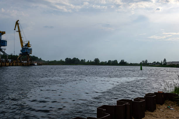 istock storm clouds forming over Riga cargo shipping port on river Daugava 1155864014