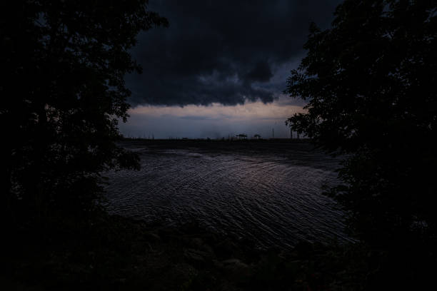 storm clouds forming over Riga cargo shipping port on river Daugava on June 13, 2019. Riga, Latvia