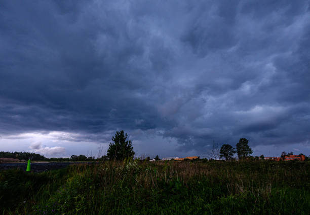 istock storm clouds forming over Riga cargo shipping port on river Daugava 1155864147