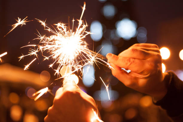 istock Cross Bengal Lights on Christmas New Year Eve 1155866463
