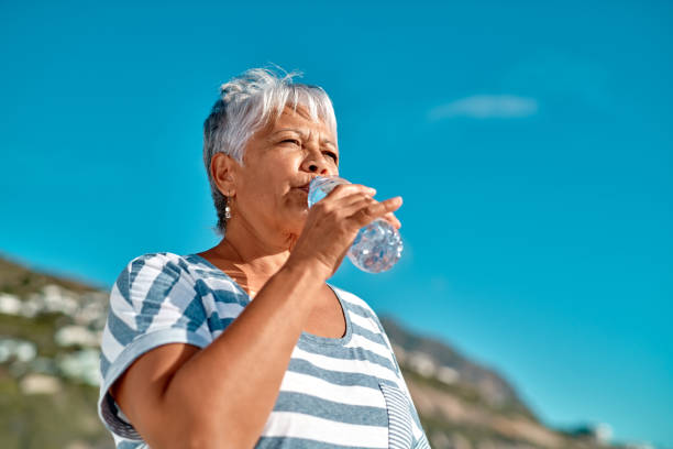 istock Quenching my thirst during this hot day 1155866960