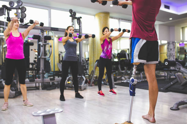 istock Man with prosthetic leg in the gym 1155869068