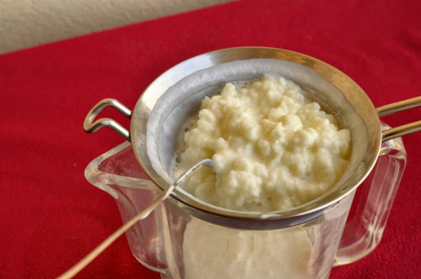 istock Pouring of the Kefir, 1155869412