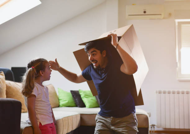 istock Oh NO, dad pretends to be a robot again 1155869601