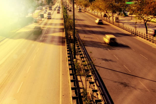 istock High angle view of highway and sunbeam with blurred motion vehicles 1155869714