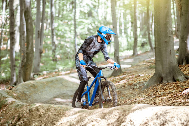 istock Cyclist riding on the forest track 1155873267
