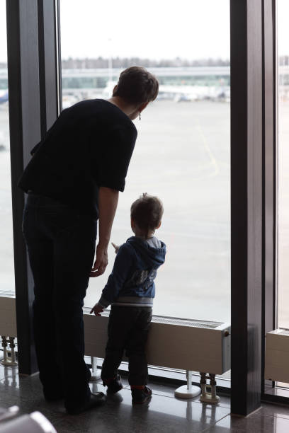 istock Family at airport 1155873450