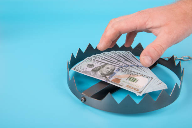 istock Business trap and dollar bills, money. 1155873943