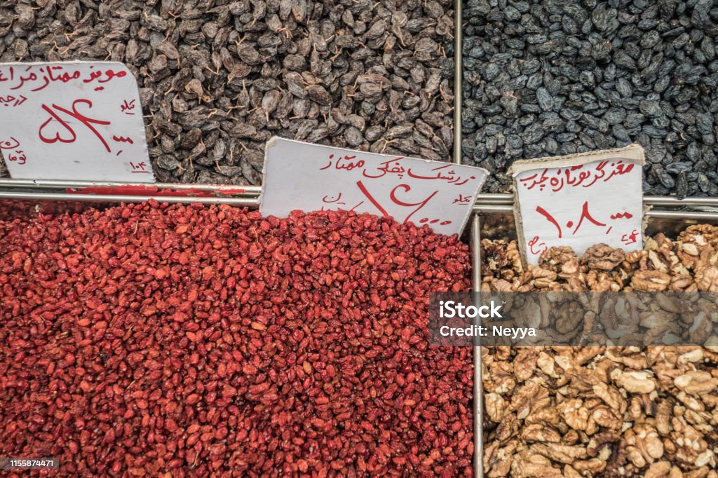 Nuts, Dried Cranberry, Spices and Herbs in Tehran Market, Iran The Grand Bazaar is Historical Bazaar in Tehran, Iran, Specializing in Different Types of Goods Asia Stock Photo
