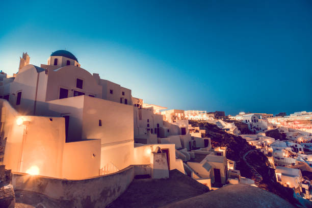istock Santorini Lights Under The Night Sky 1155875013