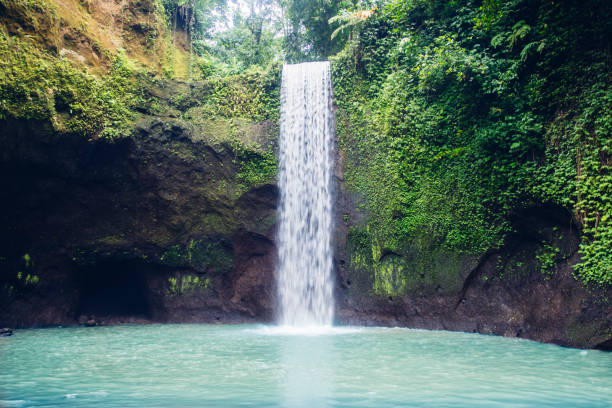 istock Tibumana waterfall at Bali, Indonesia 1155877770