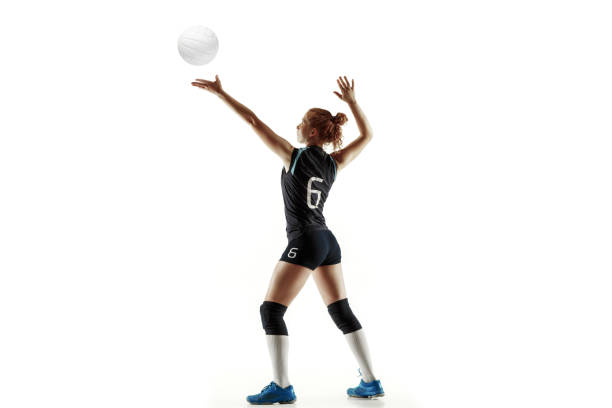 istock Young female volleyball player isolated on white studio background 1155878393