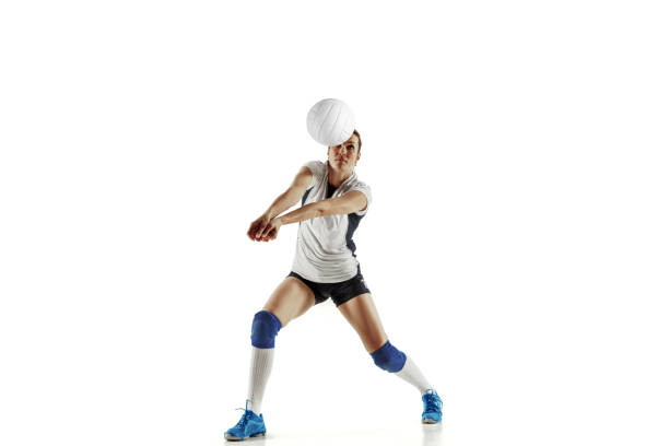 istock Young female volleyball player isolated on white studio background 1155879322