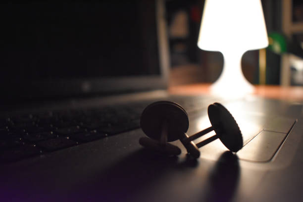 istock soft light, laptop keyword and cufflinks 1155881008