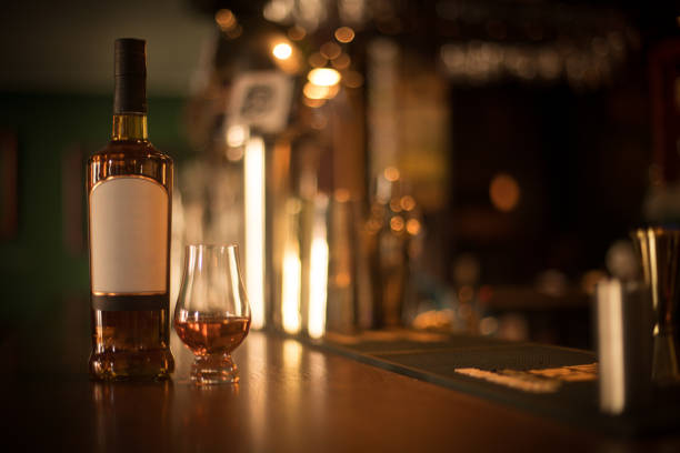 istock Glencairn whisky glass and bottle 1155886477