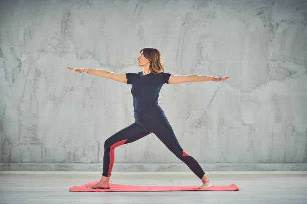 istock Woman doing yoga. 1155886772