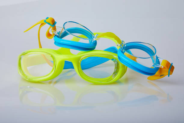 istock Kid's and adult pool goggles. 1155890407