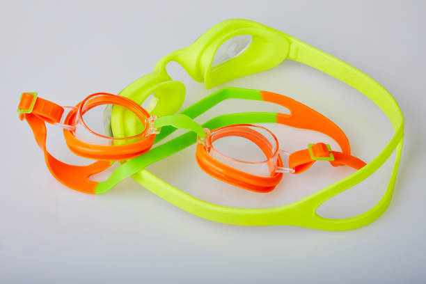istock Kid's and adult pool goggles. 1155890486