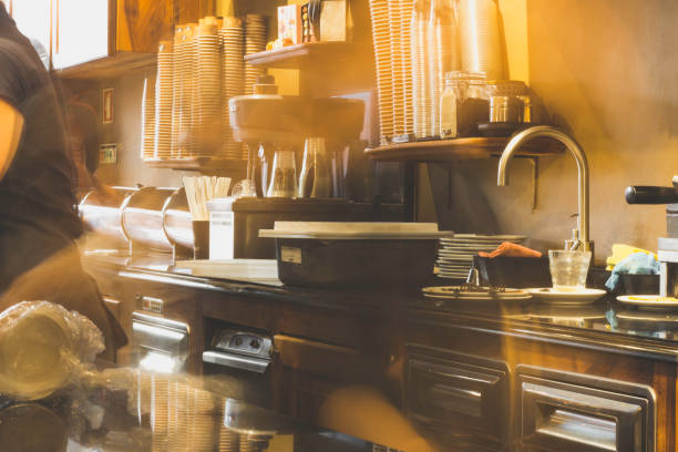 istock Interior Of Coffee Shop - shot at slow speed - workers blurred 1155895683