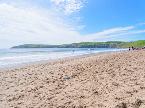 istock Tourists enjoying Aberdaron Beach in Wales. 1155897653