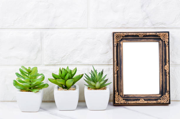 istock Blank vintage photo frame on wall 1155898866