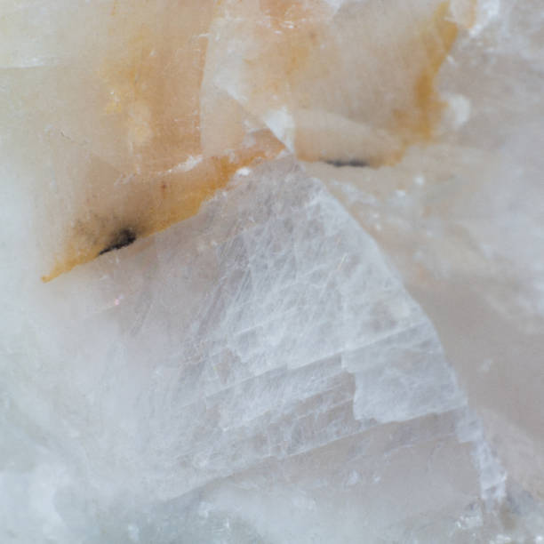 istock Texture of natural untreated white calcite close up 1155899233
