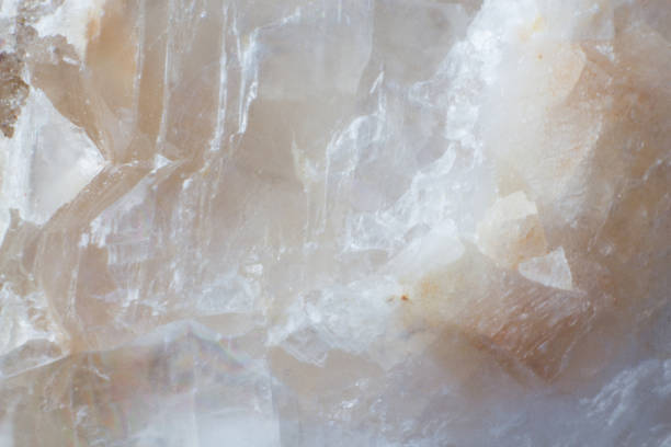istock Texture of natural untreated white calcite close up 1155899234