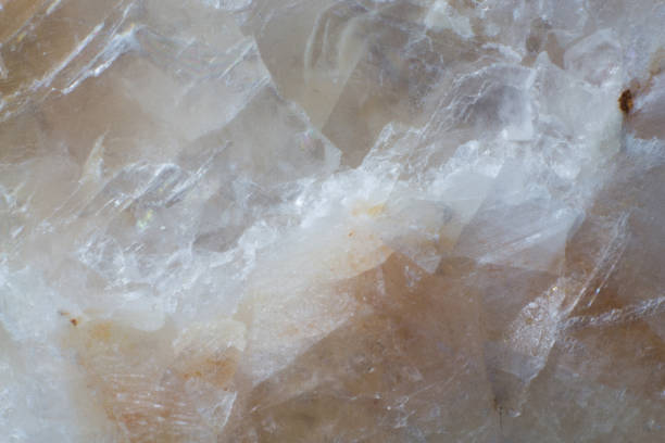 istock Texture of natural untreated white calcite close up 1155899408