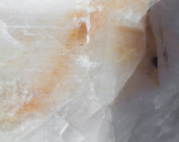 istock Texture of natural untreated white calcite close up 1155899409