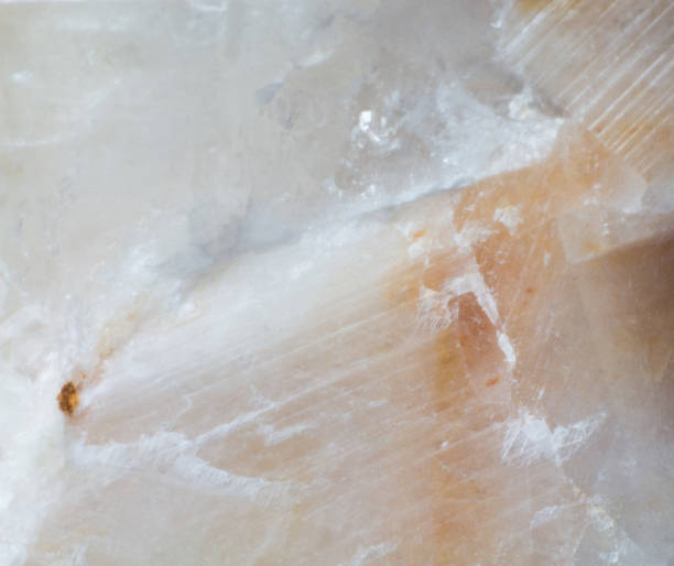 istock Texture of natural untreated white calcite close up 1155899984