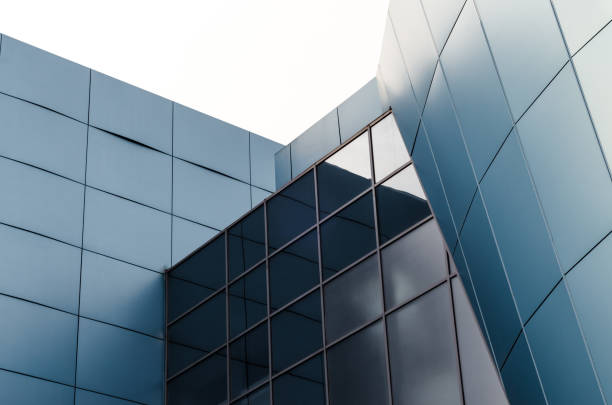 istock facade of the building with blue panels and reflective surfaces 1155902389