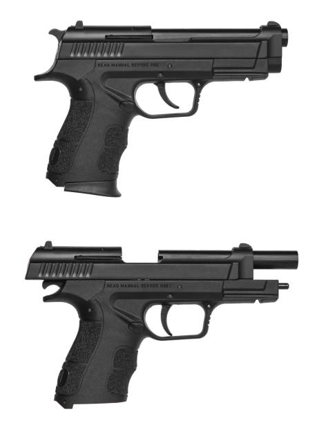 istock Black gun pistol isolated on white background 1155903181