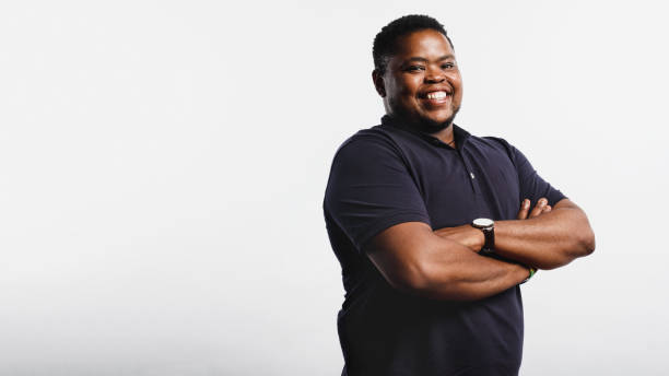 istock Portrait of cheerful african man 1155905546