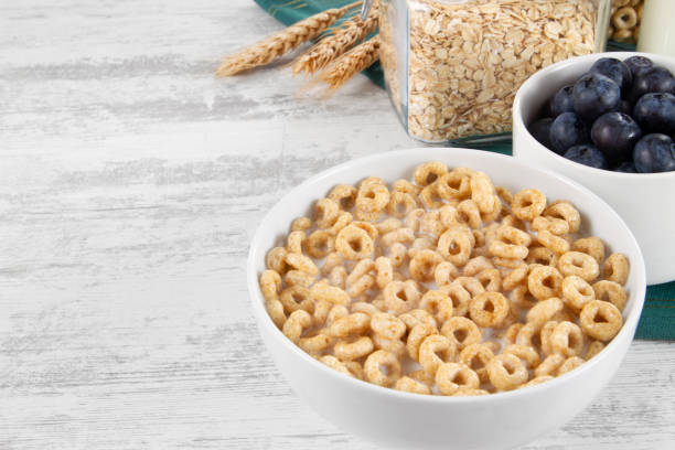 istock Breakfast Cereal in Bowl with Blueberries and Milk Bottle 1155907039