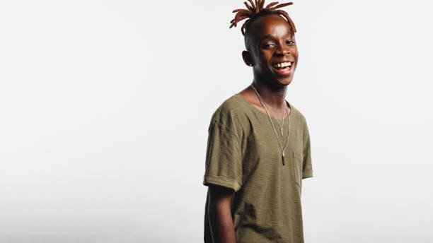 istock Portrait of smiling african man with dreadlocks 1155908112