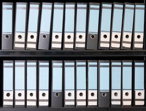 Old unwritten file folders on a shelf