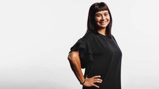 istock Portrait of smiling woman 1155908802