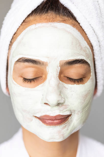 istock Young Woman with Mask 1155909689