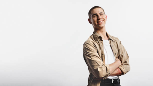 istock Portrait of smiling young man 1155911028