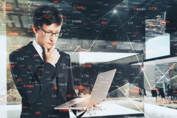 istock Businessman with forex laptop 1155911102
