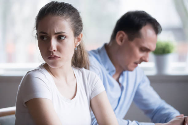 istock Millennial couple after fight at home ignoring each other 1155911444